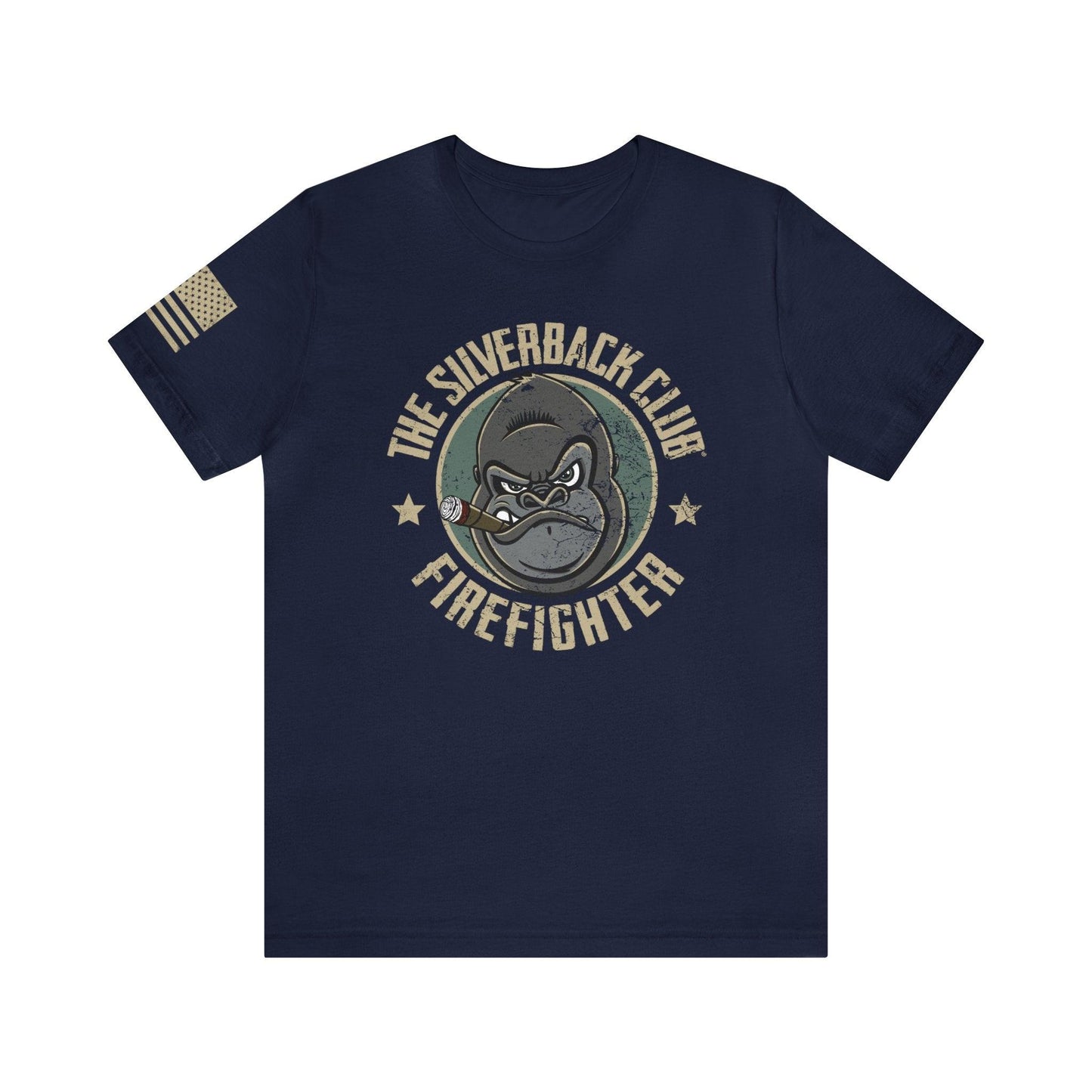 The front of a blue t-shirt and The Silverback Club logo consisting of a gorilla's face smoking a cigar and the words "Firefighter" underneath. The U.S. flag is on the right sleeve.