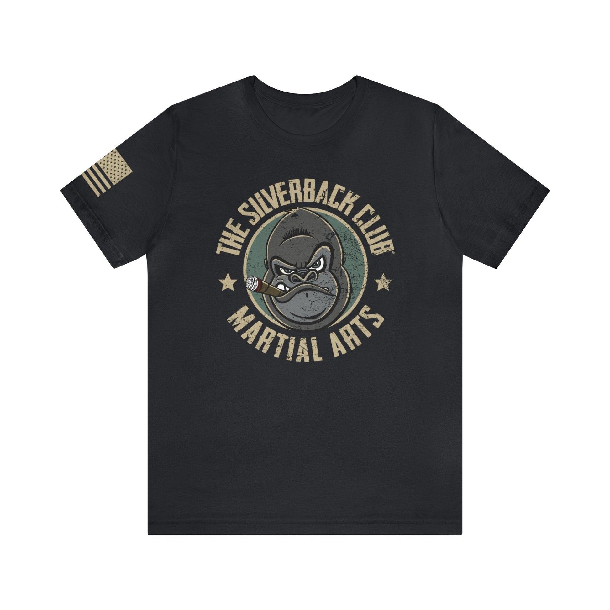 The front of a vintage black t-shirt and The Silverback Club logo consisting of a gorilla's face smoking a cigar and the words "Martial Arts" underneath.