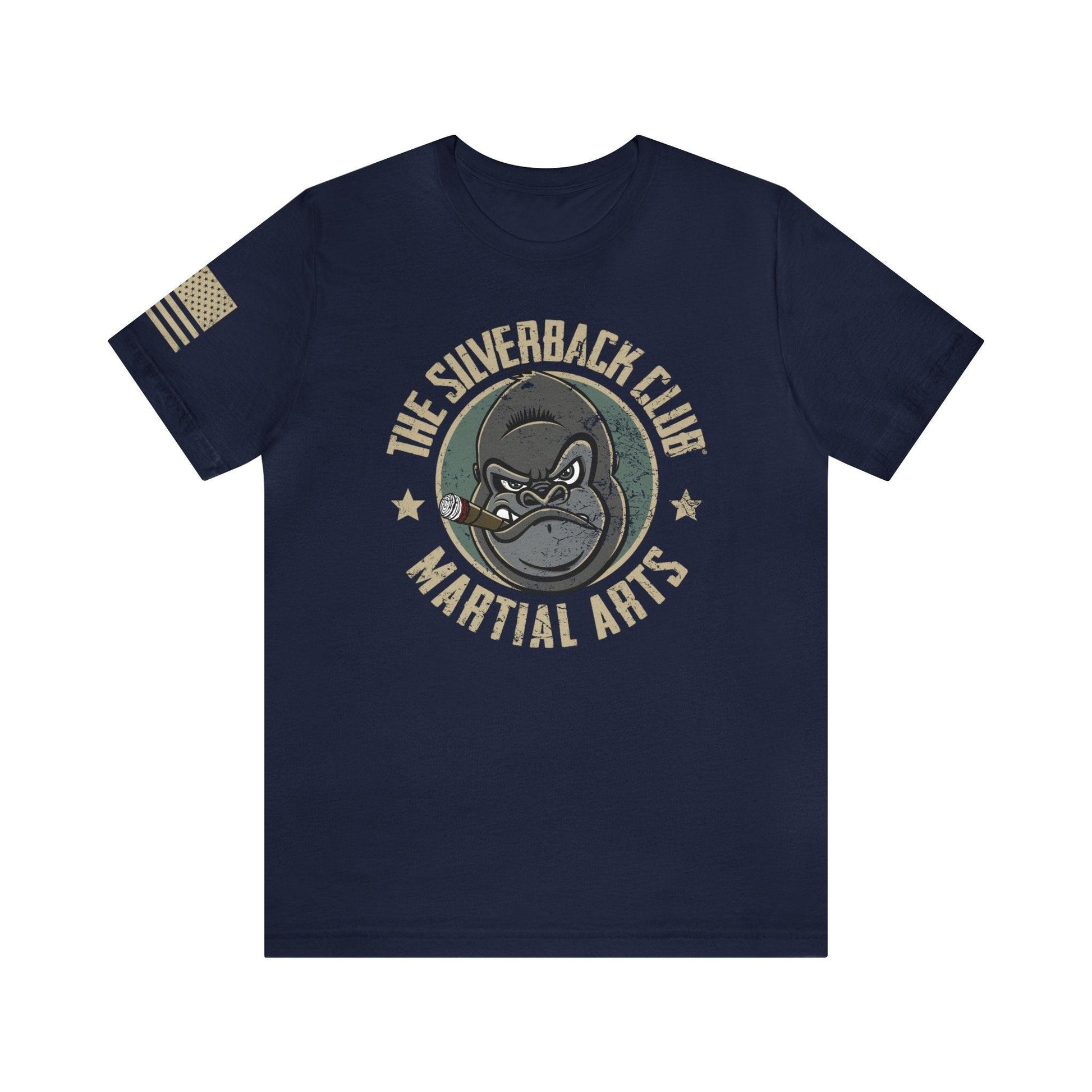 The front of a blue t-shirt and The Silverback Club logo consisting of a gorilla's face smoking a cigar and the words "Martial Arts" underneath.