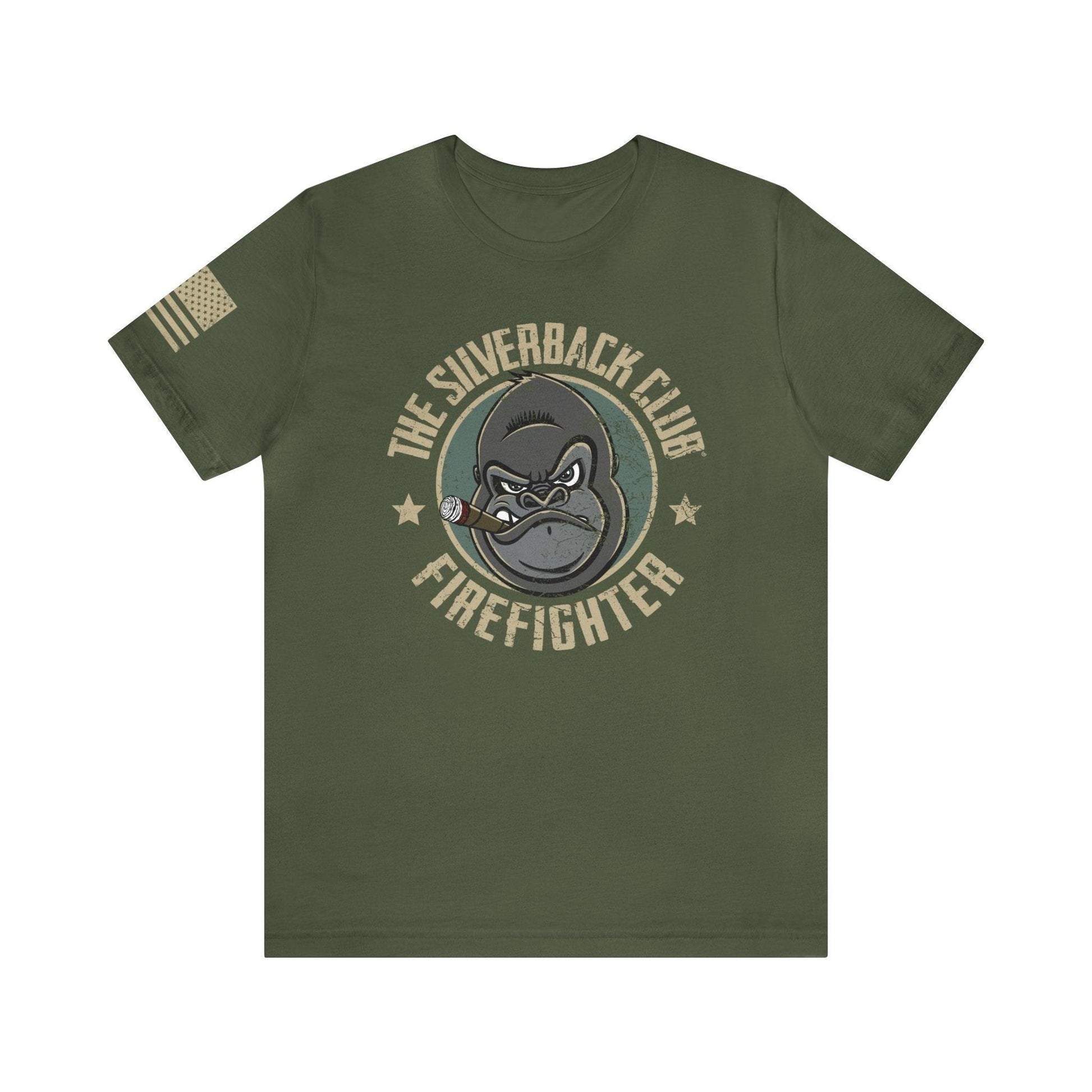 The front of a green t-shirt and The Silverback Club logo consisting of a gorilla's face smoking a cigar and the words "Firefighter" underneath. The U.S. flag is on the right sleeve.