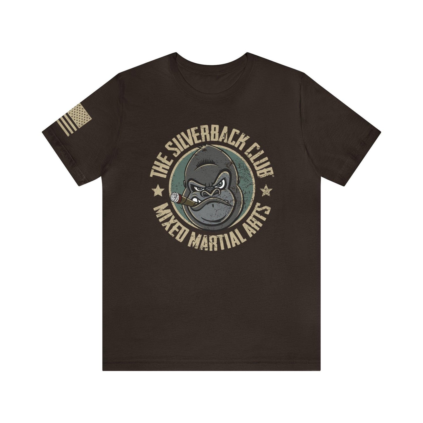 The front of a brown t-shirt and The Silverback Club logo consisting of a gorilla's face smoking a cigar and the words "Mixed Martial Arts" underneath.